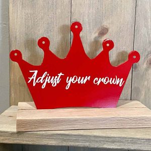 red crown that says Adjust Your Crown