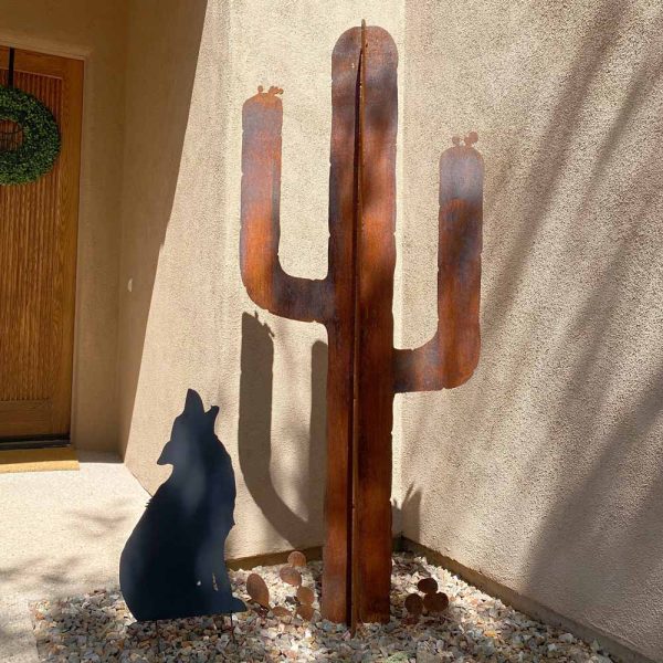 rusted metal saguaro cactus with black matte coyote howling