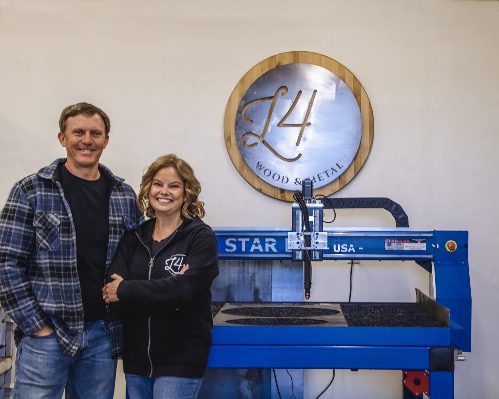 Crazy Good Media, LLC | Steve and Becca Ludlum stand in front of a plasma table at their shop in Vail, Arizona